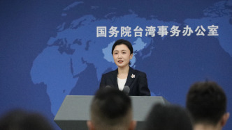 “一键投诚”软件引热议 国台办：网友个人创意