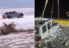 越野车水库冰面练漂移 冰层破裂车轮被冻6小时 吊车深夜将车吊出