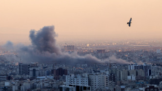 美以对伊发动军事打击 人民日报：世界不能退回丛林时代