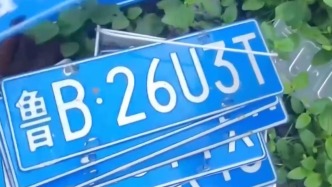 央媒曝光报废车黑色产业链：垃圾堆发现上百个车牌