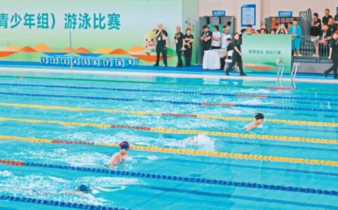 包揽金牌、奖牌、团体总分三项第一 西安游泳小花缘何绚丽绽放？