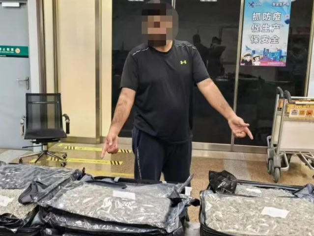 2名外国人“借道”中国转运70公斤毒品被查 最终获刑